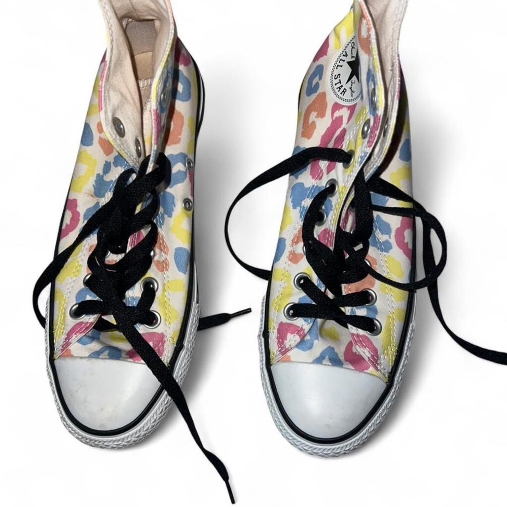 Converse Chuck Taylor All-Star canvas trainers in multi-color high tops.
